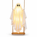 Festwick GlowSwing glowing ghost seated on a real wooden swing with hemp ropes, on white