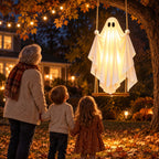 Grandmother and children looking at the glowing ghost swing on the porch